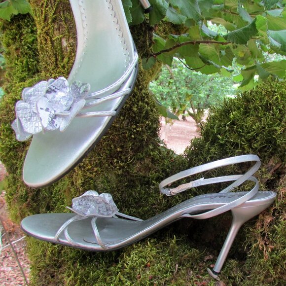 BCBG PARIS Shoes - SILVER SHOES, 8.5, BCBG WRAPAROUND ANKLE STRAPS, 4" SPIKE HEELS, FLORAL DETAIL